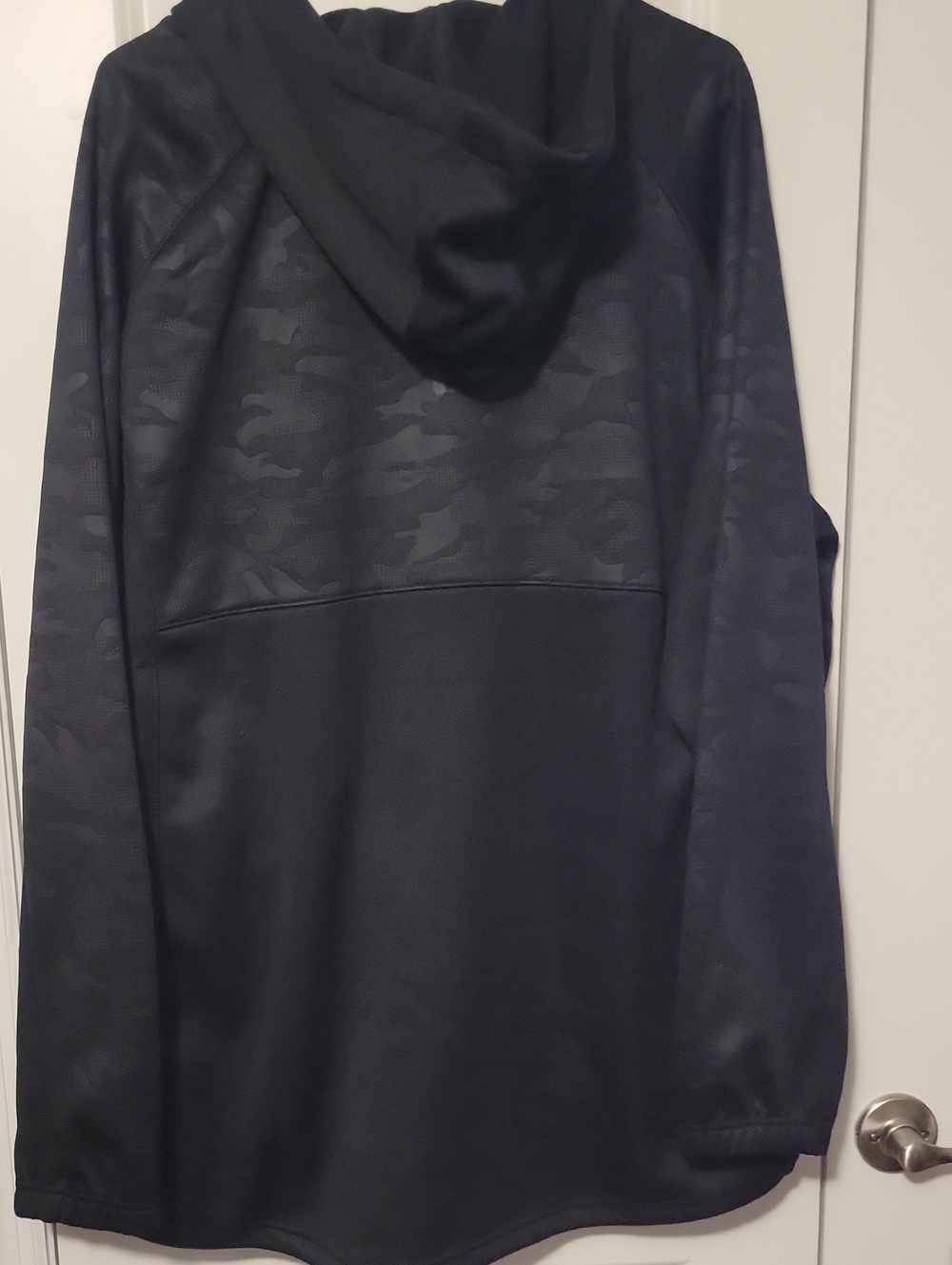 Black Hooded Performance Jacket with Subtle Camo Texture